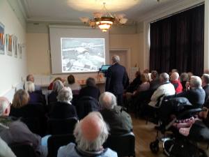 Ken Cothliff speaking to a packed audience about the history of Leeds Bradford 